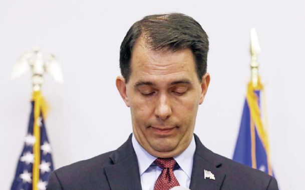 Walker exits ’16 race with harsh words for Trump