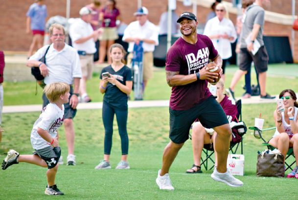 Prescott gives back at camp at MSU