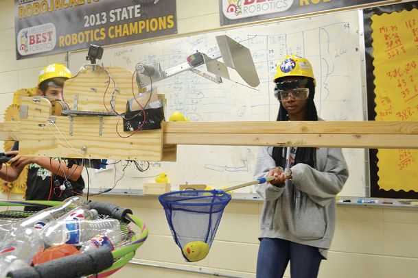 Getting into gear: Three area teams to compete in BEST robotics challenge; RoboJackets seek seventh state title