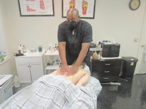 Local massage therapist opposes cuts to training hours