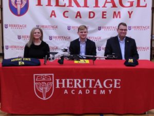 Heritage Academy senior John Blanton signs to continue rifle career at Murray State