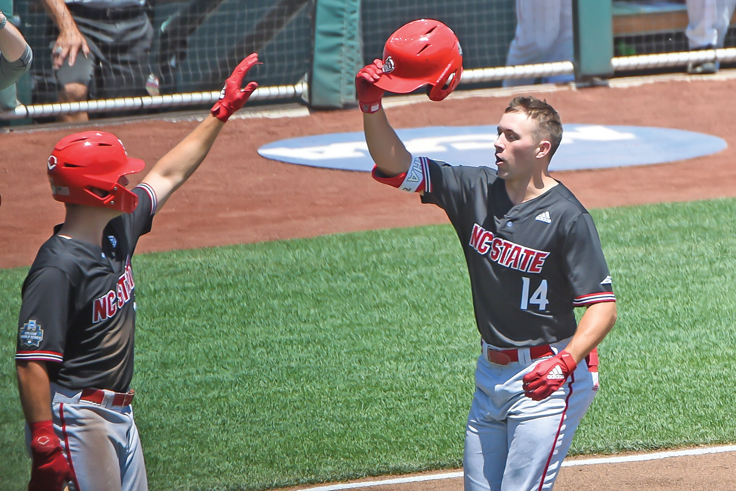 NC State knocks out No. 1 Arkansas on Torres; homer in 9th