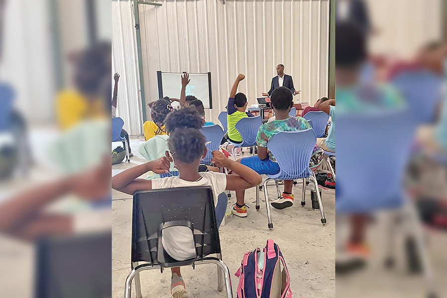 MSU engineering alum writes children’s book on financial literacy, presents to local Boys and Girls Club