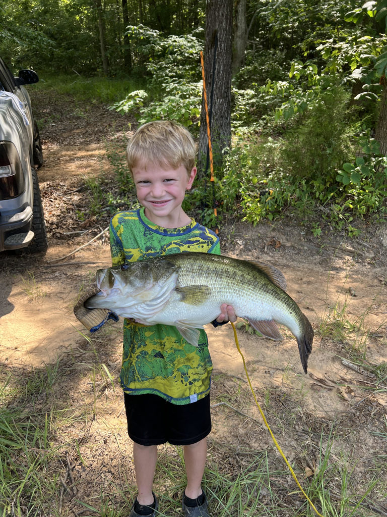 Corbin Eaves, 7, lands 7.6-pound bass