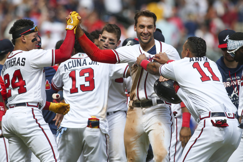 Braves score three in ninth to complete sweep of Marlins