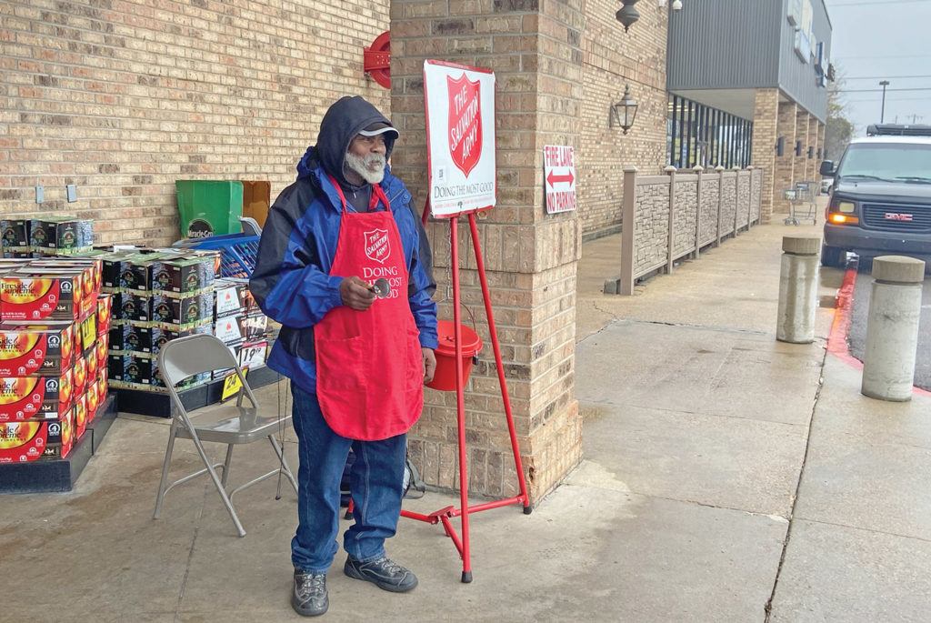 The Salvation Army's red kettle bells ring outside Kroger this holiday  season