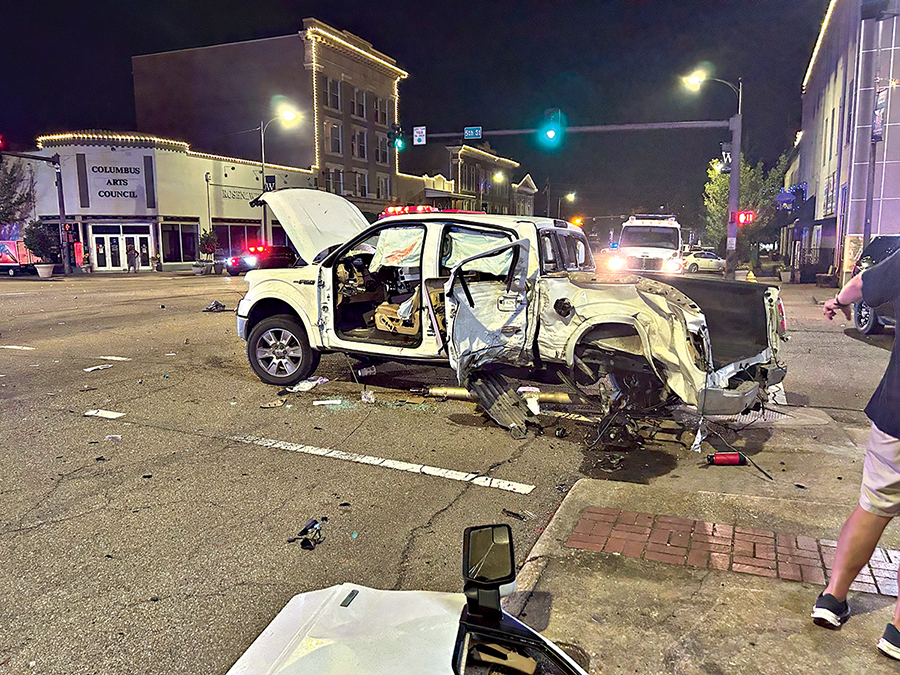 Downtown chase ends in crash, building damage