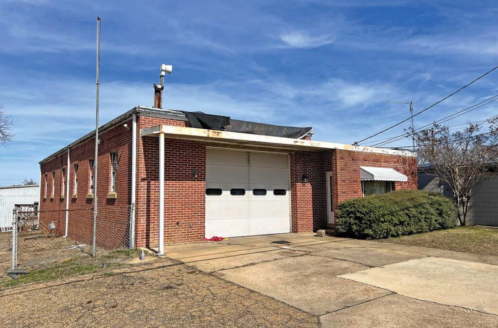 Old fire station listed for sale with real estate broker